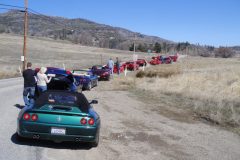 cars-stopped-at-lake-c